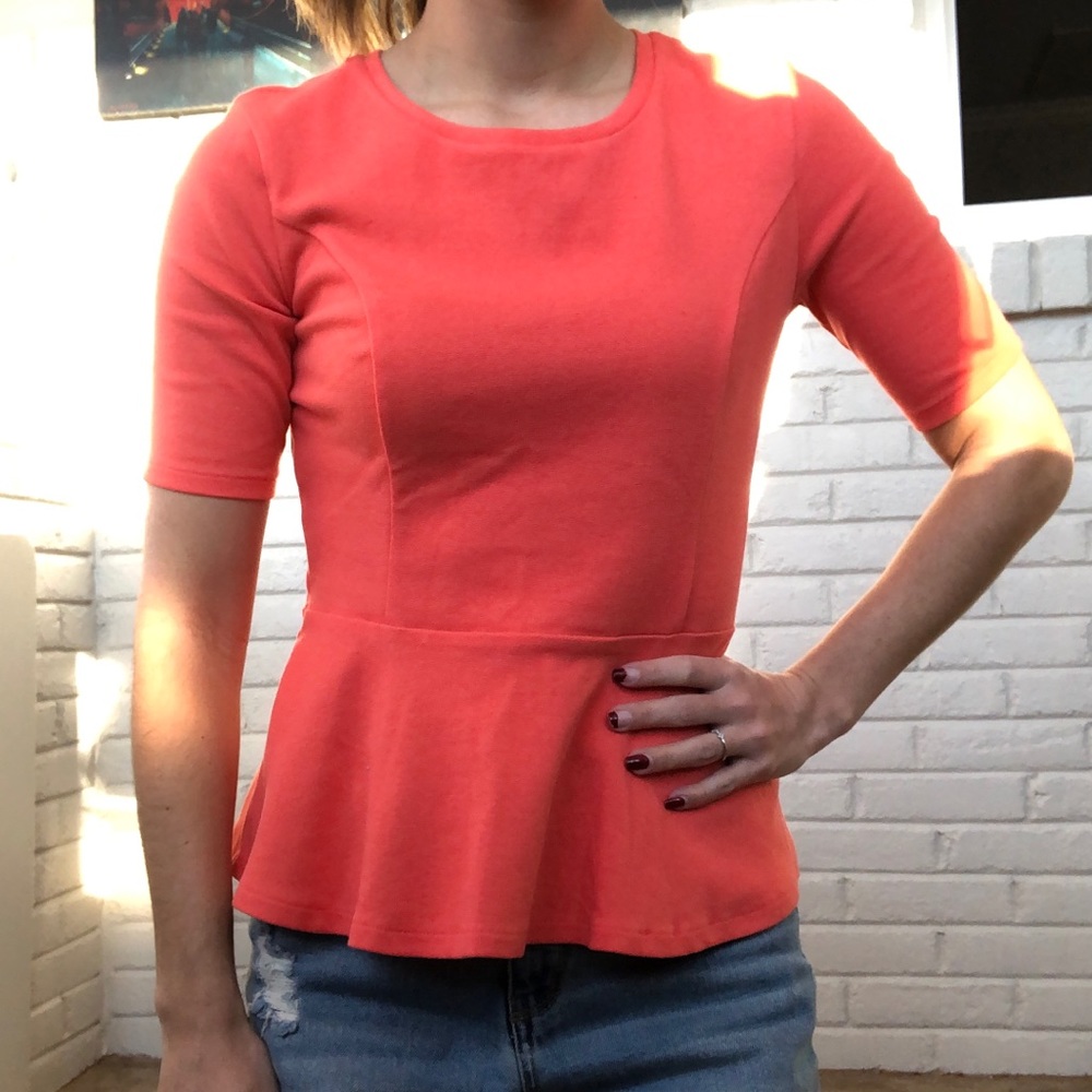 Coral peplum top